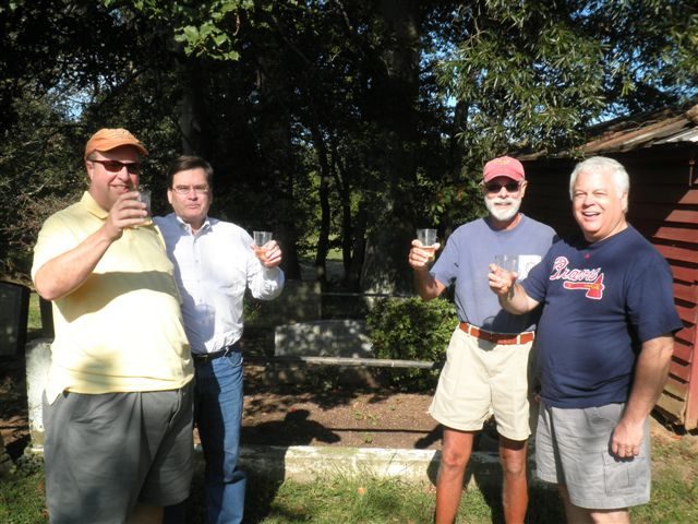 Four brothers with drinks under the trees, September 2012