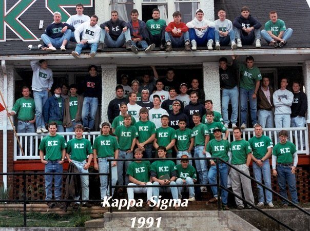 Brothers in green Kappa Sigma shirts filling the porch and steps of the house, captioned Kappa Sigma 1991